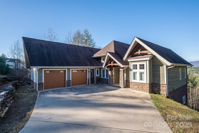 craftsman house with a garage