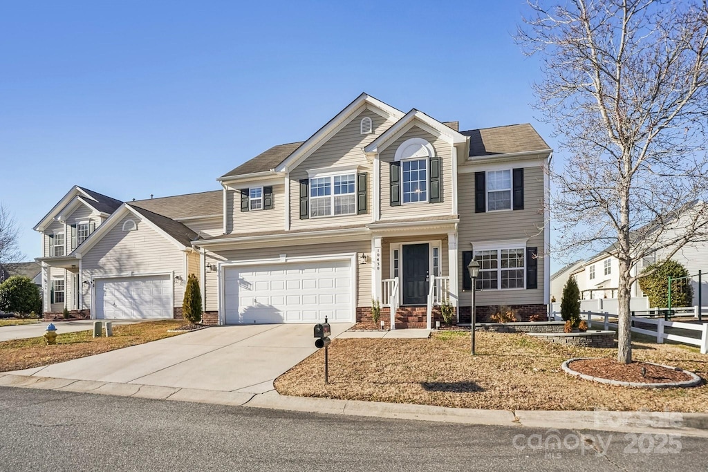 view of front of property with a garage