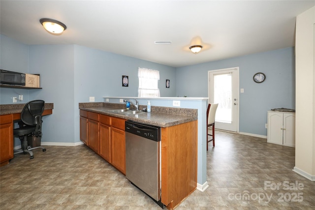 kitchen with stainless steel dishwasher, kitchen peninsula, and sink