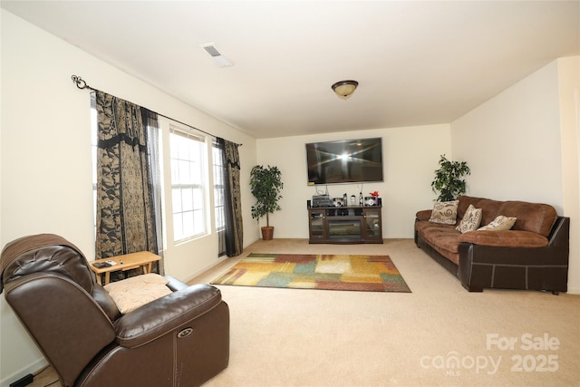 living room with light colored carpet