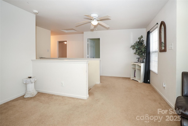 unfurnished room featuring light colored carpet