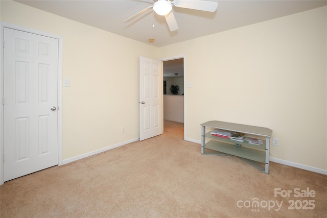 bedroom with ceiling fan and light colored carpet