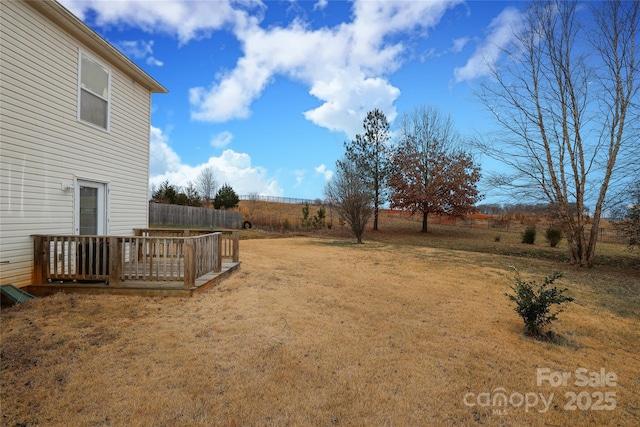 view of yard featuring a deck