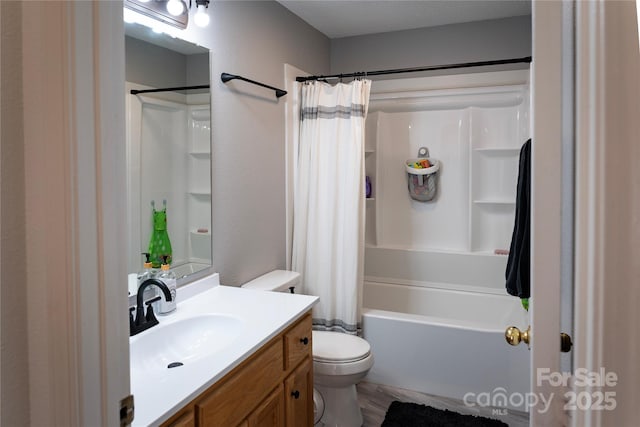 full bathroom with vanity, toilet, and shower / tub combo with curtain