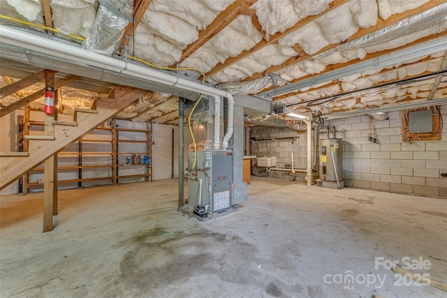 basement with heating unit and water heater