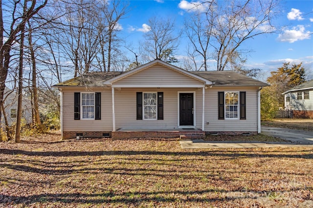 view of front of home with a front lawn and a porch