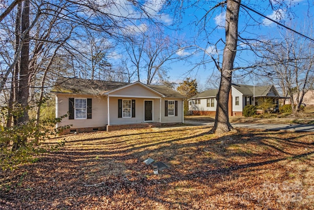 ranch-style house featuring a porch