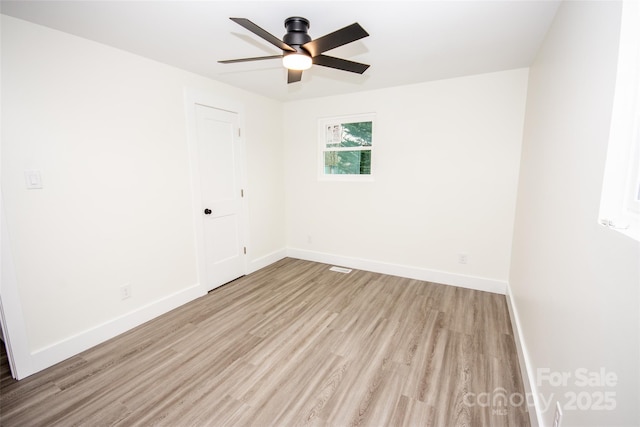 unfurnished room featuring ceiling fan and light hardwood / wood-style flooring