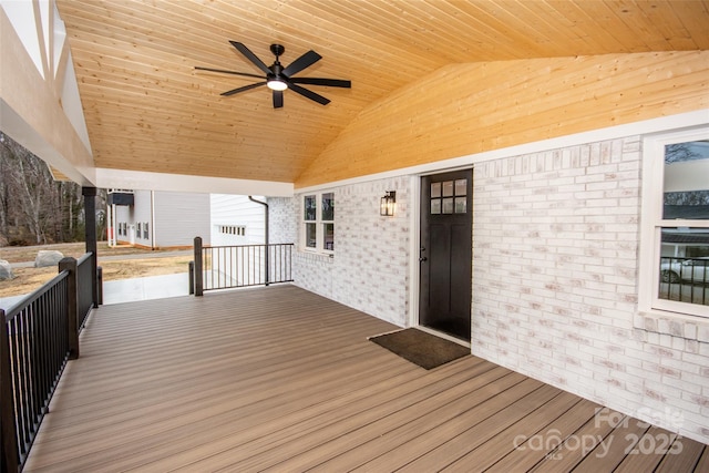 deck featuring covered porch and ceiling fan