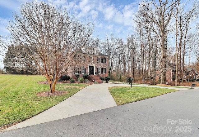 view of front of property with a front lawn