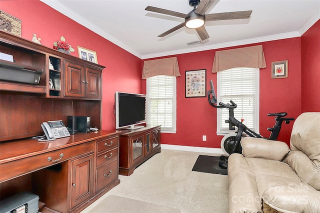 office space featuring ornamental molding, light carpet, and ceiling fan