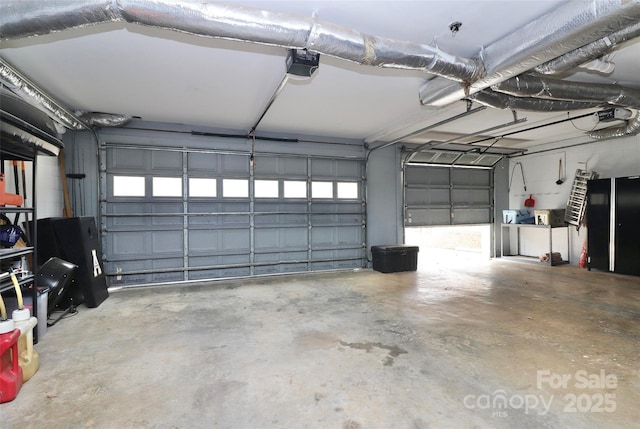 garage featuring a garage door opener