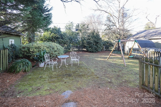 view of yard featuring a playground