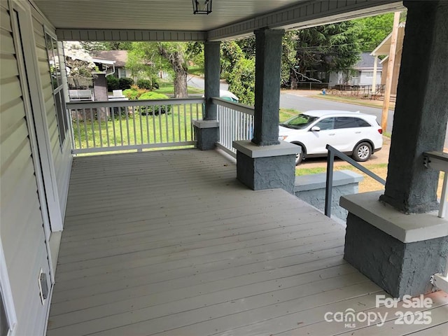 wooden deck featuring a porch