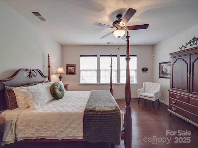 bedroom featuring dark hardwood / wood-style floors and ceiling fan