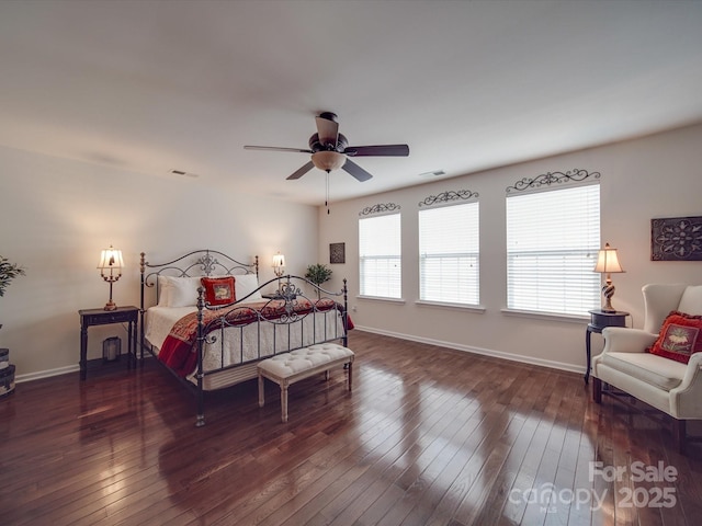 bedroom featuring ceiling fan and dark hardwood / wood-style flooring