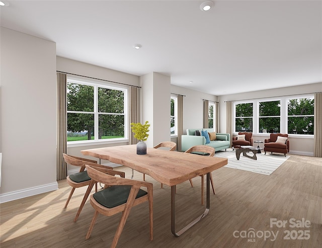 dining space with light wood-type flooring