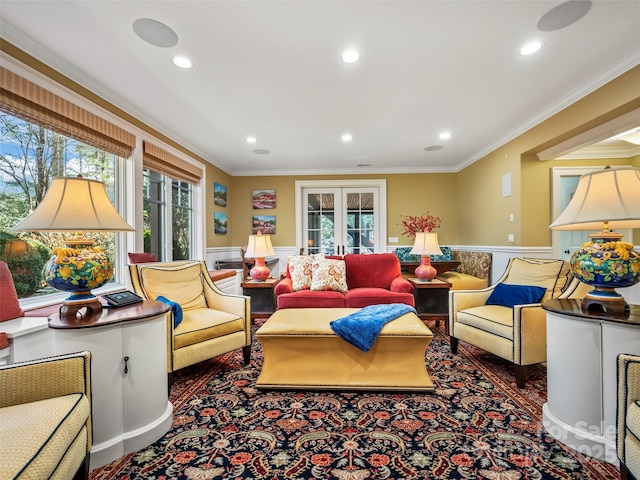 living room featuring crown molding and french doors