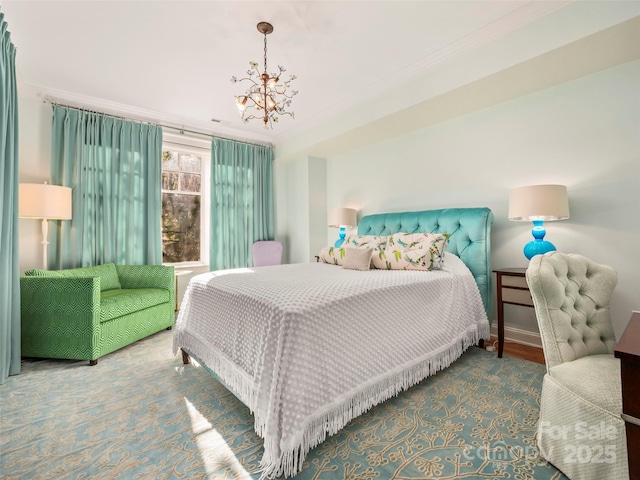 bedroom with a chandelier and crown molding