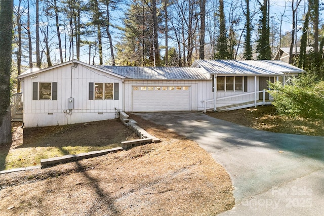 single story home featuring a garage