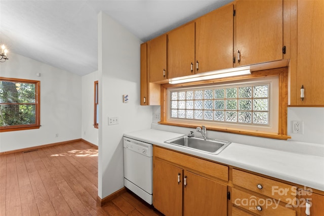 550 Kinross Dr, Flat Rock, NC 28731 - kitchen with dishwasher, an inviting chandelier, sink, vaulted ceiling, and hardwood / wood-style flooring