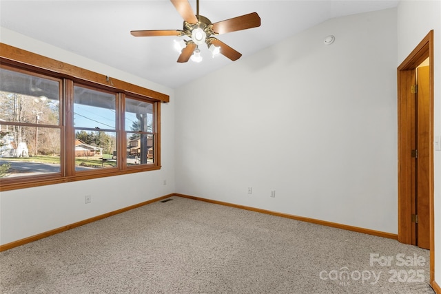 550 Kinross Dr, Flat Rock, NC 28731 - spare room with vaulted ceiling, ceiling fan, and carpet