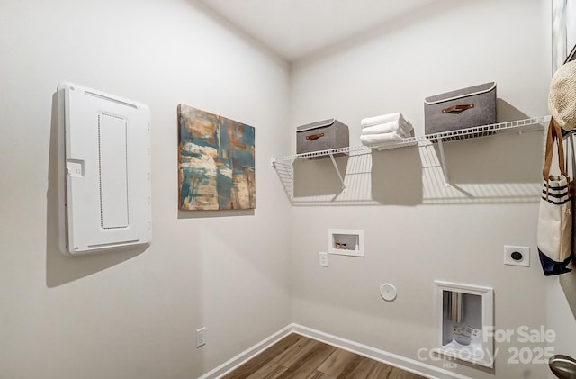 laundry area featuring gas dryer hookup, washer hookup, electric dryer hookup, and hardwood / wood-style floors