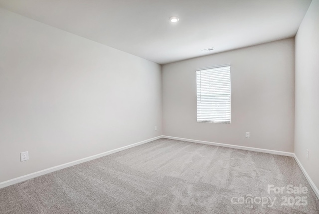 view of carpeted spare room