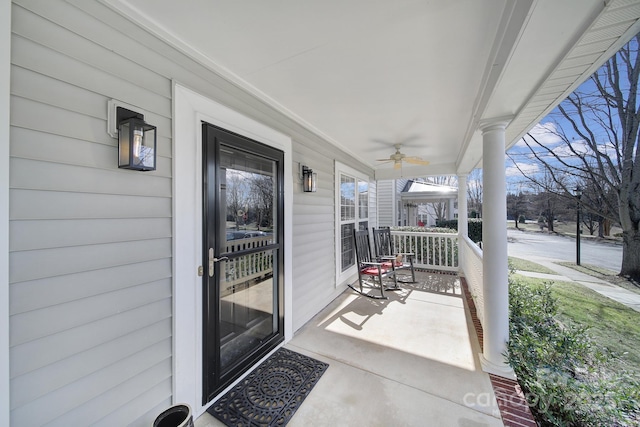 exterior space featuring ceiling fan and a porch