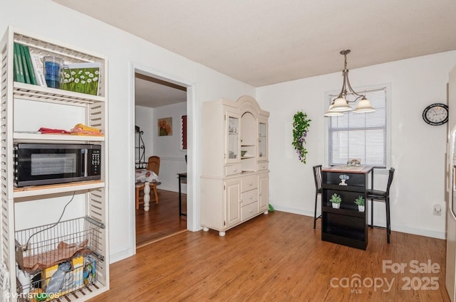 dining room featuring light hardwood / wood-style floors