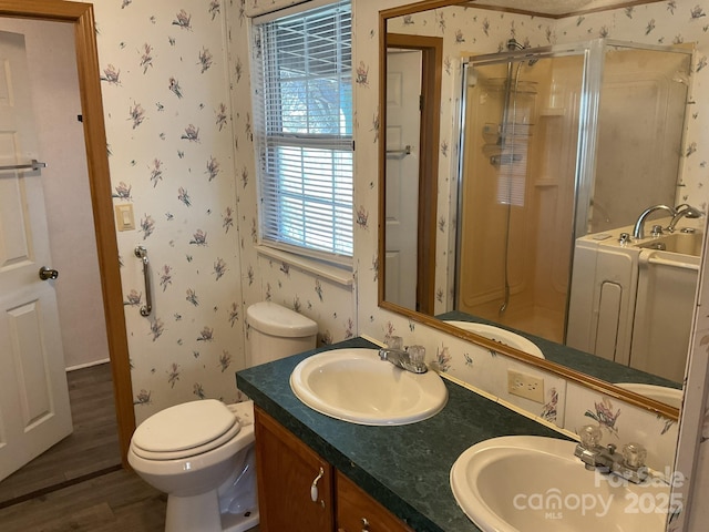 full bathroom with toilet, vanity, shower with separate bathtub, and hardwood / wood-style floors