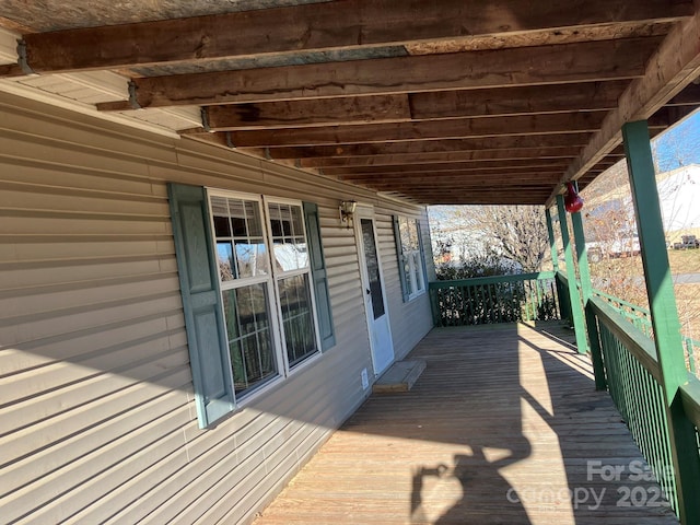 deck with covered porch