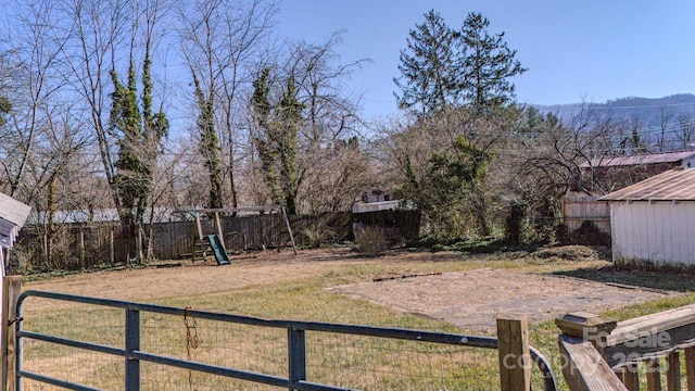 view of yard featuring a playground