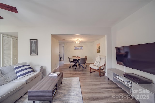 living room with wood-type flooring