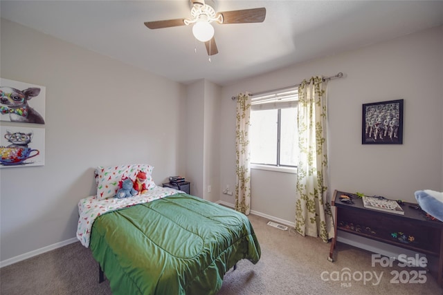 carpeted bedroom featuring ceiling fan