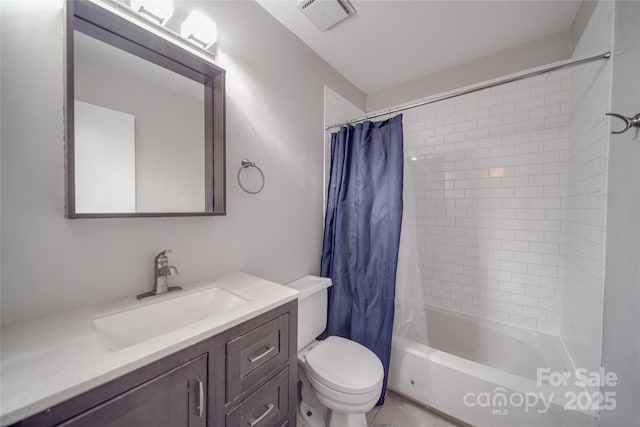 full bathroom with toilet, vanity, and shower / bath combo with shower curtain