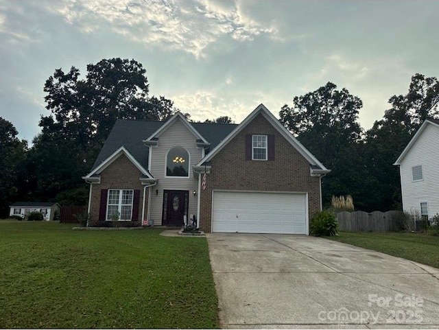 front facade featuring a front yard and a garage