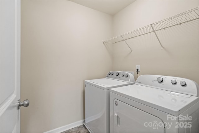 washroom featuring independent washer and dryer