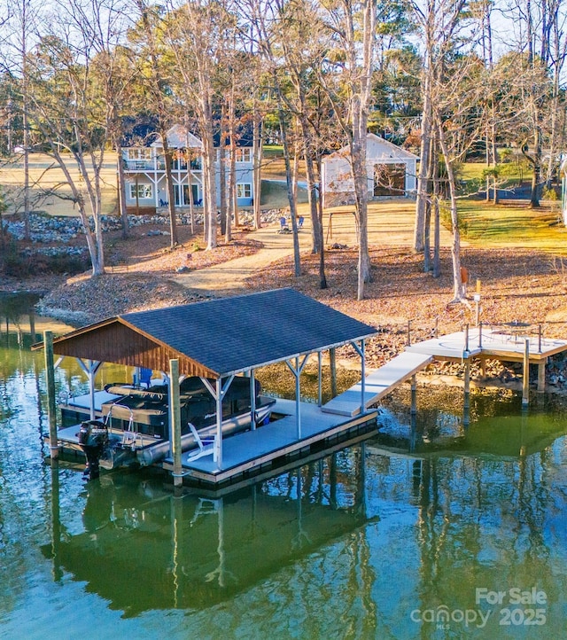 dock area with a water view