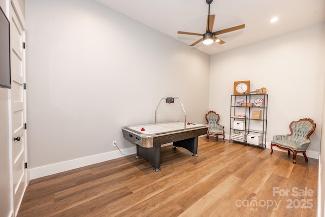 playroom featuring ceiling fan and hardwood / wood-style flooring