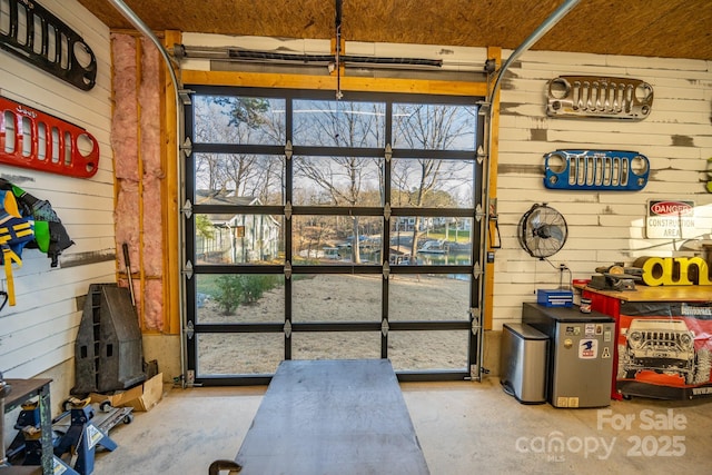 interior space featuring wood walls