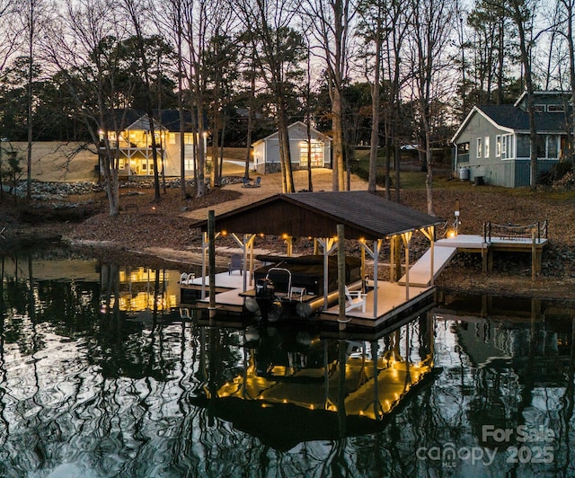 view of dock with a water view