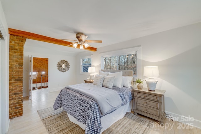 bedroom with ceiling fan and light hardwood / wood-style flooring