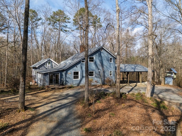 view of front of property with a carport