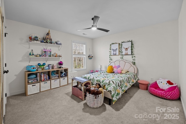 carpeted bedroom featuring ceiling fan