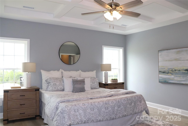 418 Huntington Woods St SE, Lenoir, NC 28645 - bedroom with wood finished floors, beam ceiling, coffered ceiling, baseboards, and a ceiling fan