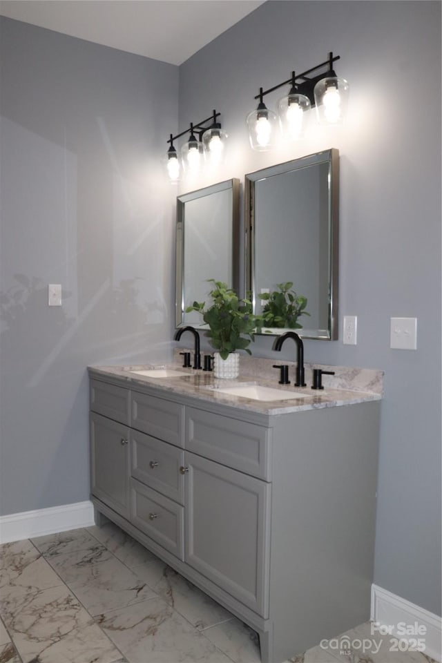 418 Huntington Woods St SE, Lenoir, NC 28645 - full bath featuring baseboards, double vanity, and marble finish flooring