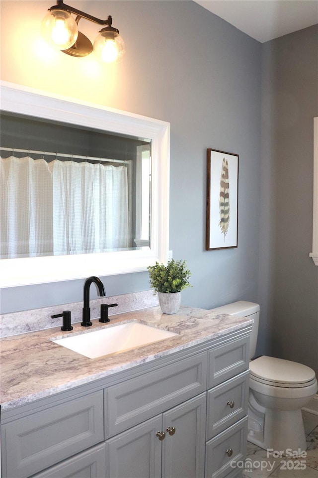 418 Huntington Woods St SE, Lenoir, NC 28645 - bathroom with vanity and toilet