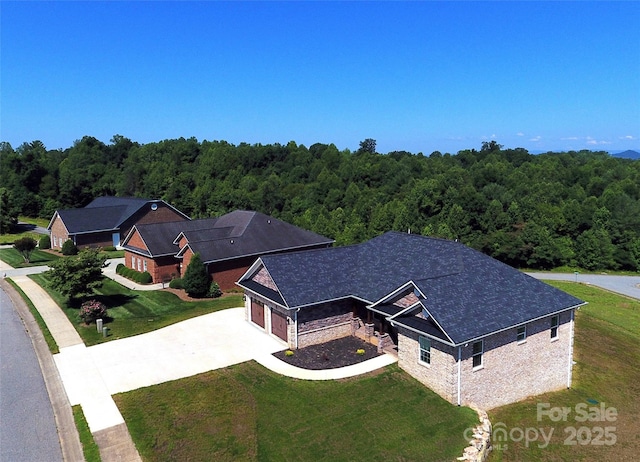 418 Huntington Woods St SE, Lenoir, NC 28645 - view from above of property with a heavily wooded area