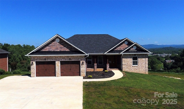 418 Huntington Woods St SE, Lenoir, NC 28645 - craftsman inspired home with a front yard, concrete driveway, an attached garage, and a porch
